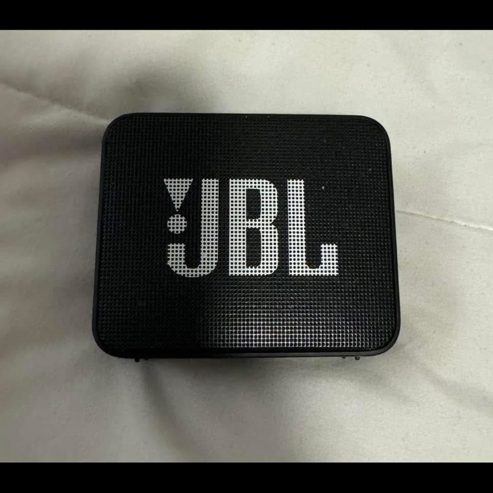 JBL Black Portable Speaker with Sleek Design and Durable Build